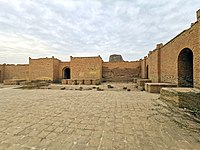 The courtyard of Enlil temple (E-U-GAL), the ziggurat is seen in the background