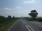Approaching Leadenham from the west with the Lincoln Cliff in the distance A17 eastbound crossing Leadenham low fields - geograph.org.uk - 1404337.jpg