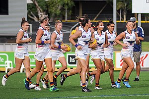 Adelaide AFLW team running out prior to the Round 6, 2017, match against Melbourne. Adelaide AFLW.3.jpg