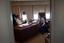 President Barack Obama meets with Rep. Dennis Kucinich, D-Ohio, aboard Air Force One en route to Cleveland, Ohio, March 2010. Air Force One Office Obama Kucinich.jpg