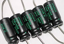 Axial style aluminum electrolytic capacitors