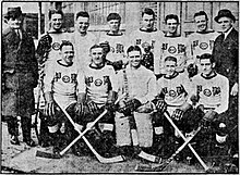 Boston Pere Marquette team in 1921-22 (Top row left to right: E. Anderson, Jim Healy, Frank Storey, Billy Roach, Alec Campbell, Bernie Healy, J. Collins (trainer), Spike Doran. Bottom row left to right: Johnny Murphy, Frank Synott, Arthur Donahue, Farrell Conley, Eddie Enright) Boston Pere Marquette Knights of Columbus.jpg