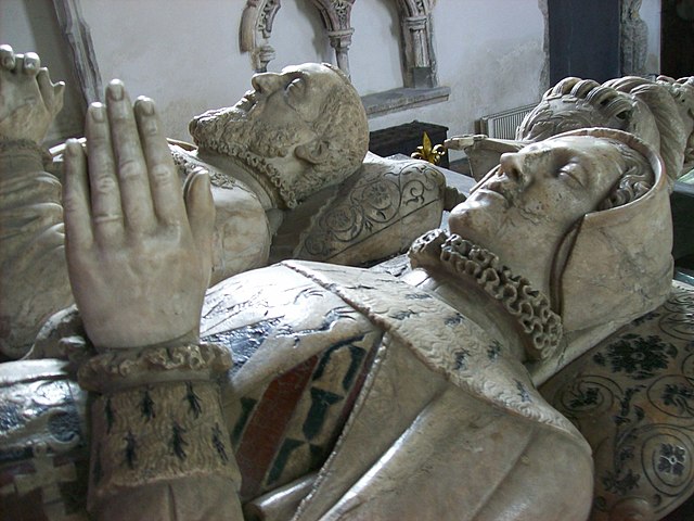Detail of effigies of George Brooke, 9th Baron Cobham, and of his wife Anne Bray, St Mary Magdalene's Church, Cobham, Kent. Anne displays on her chest