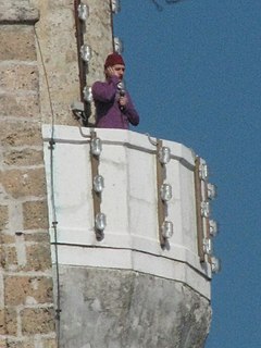 Muezzin Person appointed at a mosque to lead and recite the call to prayer