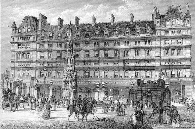 The front entrance of Charing Cross station in a 19th-century print. The reimagined Charing Cross is in front of the Charing Cross Hotel.