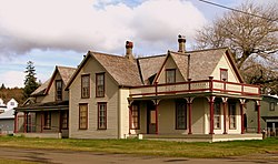 A two-story, wood-frame house