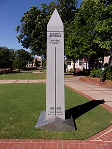 A monument marking the Eastern Continental Divide that shows where the watershed drains, located on the Duluth Town Green in Duluth, Georgia ECD Duluth GA.jpg