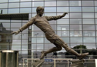 The statue of Hughes outside the building Emlyn Hughes Barrow.jpg