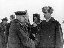 Generalfeldmarschall Paulus meets with Generaloberst Walter Heitz, then the two highest ranking German officers captured by the Allies, 4 February 1943 Field Marshal Paulus, General Heitz and other German officers of the 6th Army after its surrender.jpg