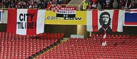 Fans of Derry City display flags during the 2007 Setanta Sports Cup. Flagsdcfc.JPG