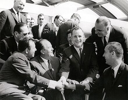 McDivitt (right) and White (3rd from right) shake hands with Yuri Gagarin (left) at the 1965 Paris Air Show.