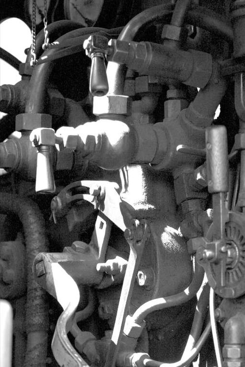 Graduable brake valve (right) and the small (upper) and large ejector cocks from a GWR locomotive