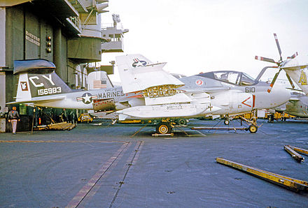 US Marine Corps EA-6A Intruder electronics aircraft of VMCJ-2 Playboys aboard USS America in 1974 during a visit to Scotland.