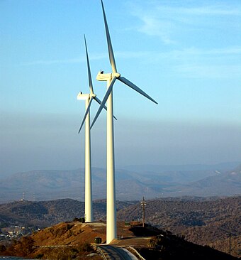 Wind turbines atop John Paul Jones Hill, the highest point on the base