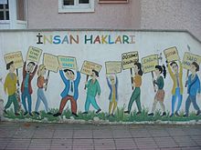 Mural depicting human rights in Turkey. The listed rights are: consumption rights, the right of a clean environment, the right to obtain information, the right to life, voting rights, the right to education, freedom of thought, right to health, equality, habeas corpus. Human Rights Mural.JPG