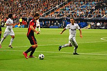 Ibrahimović on the ball for Milan in the 2010–11 UEFA Champions League