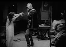 The Mercenary Soldier (Allan Sears) kills Brown Eyes (Margery Wilson)