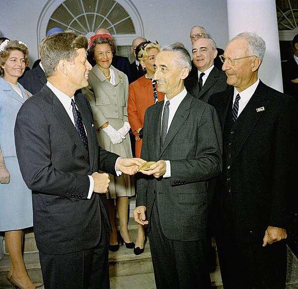 President Kennedy awards the National Geographic Society's Gold Medal to Jacques Cousteau, 1961