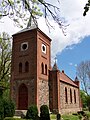 Church with cemetery, brick wall and cemetery portal