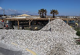 Oyster shells behind the shops of Centre Ostréicole in Leucate.