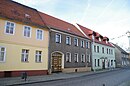 Residential building with upper arcade