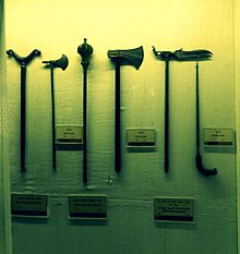 1. Dagger Crutch (fakir's crutch, mendicant's crutch), 2. Tabar (war axe), 3. Eight Bladed flanged mace, 4. Tabar (war axe) and 5. Zaghnal (battle axe) 6.Sword Stick (at the time of Mughals) Mumtaz Mahal Museum, Red Fort19.JPG