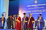 Thumbnail for File:Nitin Gadkari presenting the graduation certificate to a student of India Maritime University at the Second Convocation Day Celebration of Indian Maritime University (1).jpg