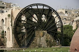 Noria and houses in Hama, Syria.JPG