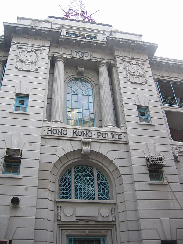 The letters "G" and "R" above the entrance to the police station is a symbol of George V of the United Kingdom.