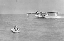 A USAAF Consolidated OA-10A Catalina (Army Air Forces designation of the Navy PBY) amphibious flying boat landing in waters off Keesler Field, Mississippi during a training exercise with U.S. Marine Corps rescue boat crews in 1944 PBY OA-10A off Keesler Field 1944.jpg