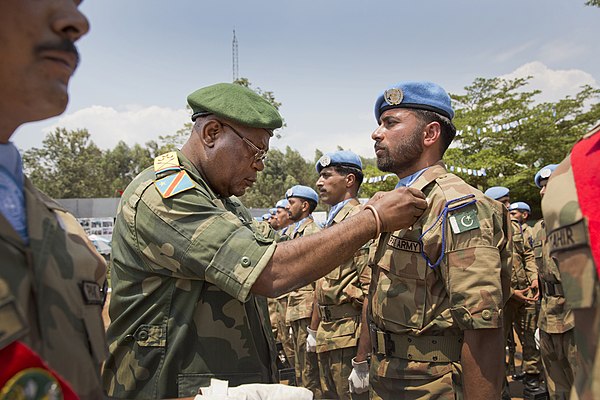 Pakistani soldiers being decorated after a tour of duty with the UN in the DR Congo