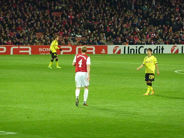 Mertesacker and Arsenal against Borussia Dortmund in the UEFA Champions League