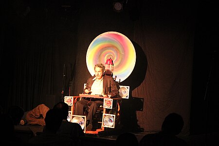 Ron Lynch in time machine at the Tomorrow! comedy show, The Steve Allen Theater 2011. Ron Lynch Time Machine.JPG