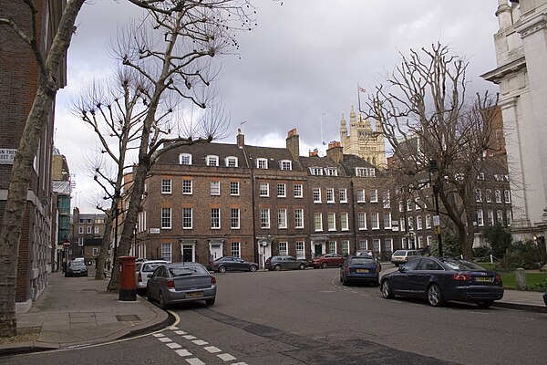 Early Georgian north side of the square with top of Victoria Tower of the Palace of Westminster beyond