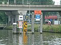 Remmingwerk met de doorvaarthoogte van de spoorbrug Gouda