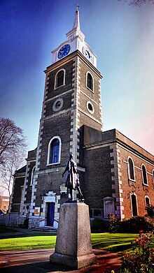 St George's church with the Pocahontas statue in the foreground St Georges Church.jpg