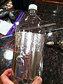 Step 11: Taped a ring of aluminum foil around the top of the soda bottle because the adhesive on the aluminum tape was nonconductive.