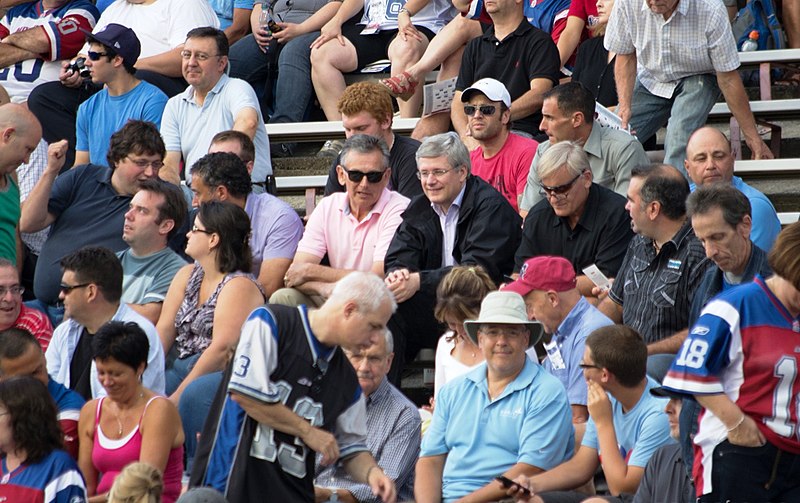 File:Stephen Harper & Larry Smith watched football game.jpg