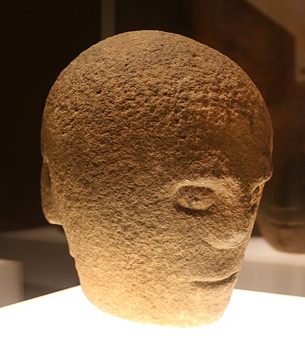The Corleck Head, a carved stone head with three-faces that is associated with the Lughnasadh. 1st or 2nd century AD.[21]