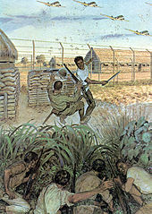 In foreground a guerrilla armed with a bolo knife is divesting a Japanese sentry of his rifle. Crouched behind the foliage and clutching U.S. issued .30 caliber M1903 series rifles, are other members of the force who wait to assist the 11th Airborne force landing in front of the camp.