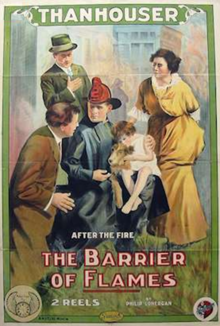 Shep (center) with Helen Badgley on the poster for The Barrier of Flames (1914) The Barrier of Flames 1914.png