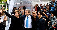 O actor y musico Jeff Bridges en 2009, con Ewan McGregor, George Clooney y Grant Heslov.