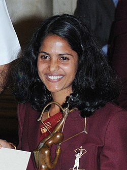 The President, Smt. Pratibha Devisingh Patil presenting the Arjuna Award for the year-2011 to Ms. Preeja Sreedharan for Atletics, in a glittering ceremony, at Rashtrapati Bhavan, in New Delhi on August 29, 2011 (cropped).jpg