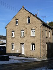 A house constructed of tuff blocks in Germany Tuffstein Haus.jpg