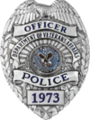 VA Police Badge in use from 1989 to 2013 USA - Veterans Affairs Police Badge.png