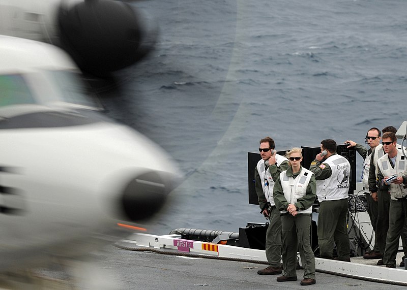 File:US Navy 100312-N-7908T-228 Landing signal officers observe an E-2C Hawkeye assigned to Carrier Airborne Early Warning Squadron (VAW) 120 as it lands aboard the aircraft carrier USS George H.W. Bush (CVN 77).jpg