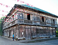 Vega Ancestral House, built with the bahay na bato prototype style with sculptures of Atlases