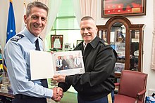 The eighth Warrant Officer of the Air Force, Robert Swanwick (left), with US Senior Enlisted Advisor to the Chairman, Sergeant Major John W. Troxell, in 2017. Warrant Officer Robert Swanwick and Sgt. Maj. John W. Troxell.jpg