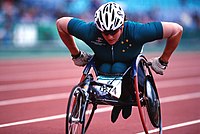 Louise Sauvage in action at the 2000 Paralympic Games in Sydney 281000 - Athletics wheelchair racing Louise Sauvage action - 3b - 2000 Sydney race photo.jpg