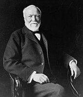 Scottish-born American industrialist and philanthropist Andrew Carnegie Andrew Carnegie, three-quarter length portrait, seated, facing slightly left, 1913.jpg